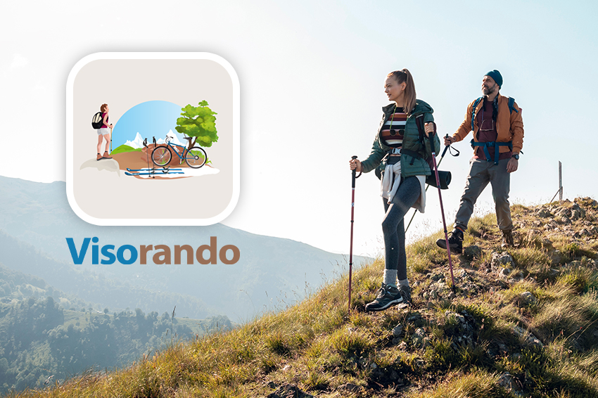 Un homme et une femme en randonnée en montagne avec à côté le logo Visorando